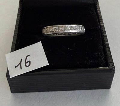 a ring in a box with a price tag on it
