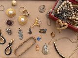 a box of jewelry that is sitting on a table