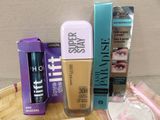 various cosmetics products on a tray on a table