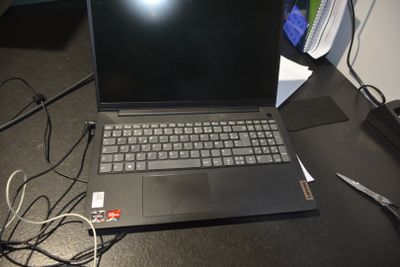 a laptop computer that is sitting on a desk