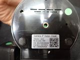 a person holding a camera in their hand with a qr code on it