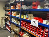 many shelves with various items on them in a store