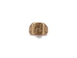 a gold ring with an image of a man and a woman on it