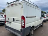 a white van that is parked in a parking lot
