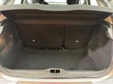 a trunk of a car with the back seats folded down