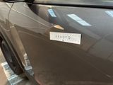 a sticker on the door of a car that says auto