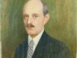 portrait d'un homme en costume-cravate sur fond vert