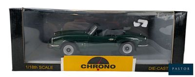 green die cast model of a classic car in a box