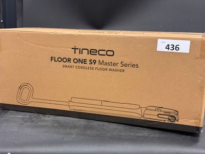 the box is empty on the table next to the floor