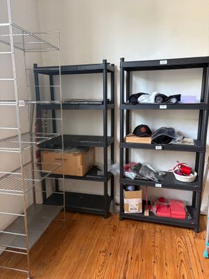a room that has a shelf with a lot of items on it