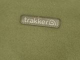 a close up of a green bag with a tag on it