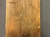 a piece of wood that has been cut in half