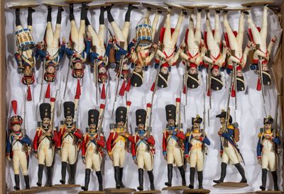 a lot of toy soldiers that are in a box
