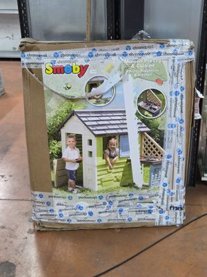 une boîte en carton sur laquelle est représentée une maison