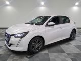a white car is parked in a room with a checkered floor