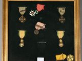 a picture of a display case with medals and medals