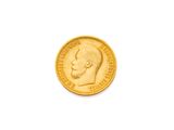 une pièce d'or sur laquelle est représentée la tête d'un homme