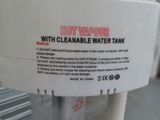 a hot water dispenser on display in a store
