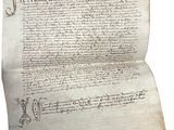 un vieux document sur lequel figurent des inscriptions