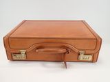 brown leather suitcase on a white background