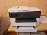 a printer that is sitting on top of a table