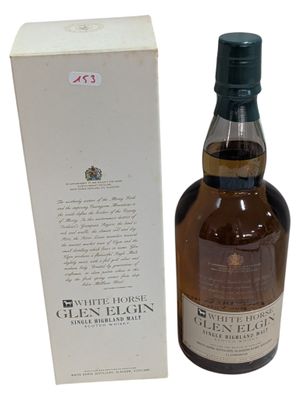 an image of a bottle of glen elgin whisky next to a box