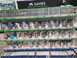 a large display of video games in a store