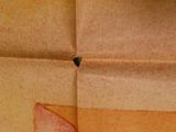 a piece of paper that has a picture of a person on it