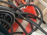 a pile of hoses that are sitting on the ground