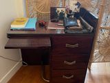 an image of a desk in a room with a window