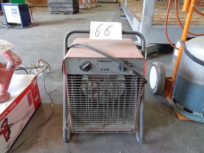 a small air conditioner that is sitting in a warehouse