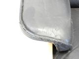 a close up of a black leather chair with a black seat