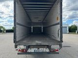 a truck that is sitting in the parking lot