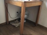a small table with a computer on top of it