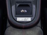 a close up of the center console of a sports car