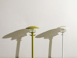 two lamps that are sitting on a white table