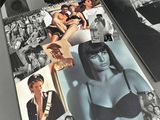 several black and white photos of women in lingersuits on a table