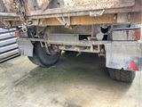 a truck that is parked on the side of the road