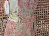 a dress on a mannequin display with a price tag on it