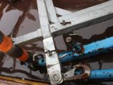 a close up view of a pipe and a pipe cutter