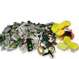 a pile of assorted items sitting on a white surface