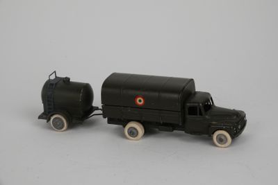 a toy truck with a tank on the back of it