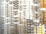 a lot of butterflies that are hanging on the wall