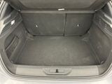 a trunk of a car that is empty and has a lot of space