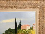 a painting on the wall of a building with a view of the ocean