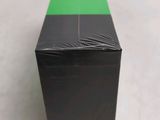 a black box with a green strip on it