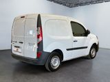 a white van that is parked in a room