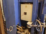a machine that is sitting inside of a building