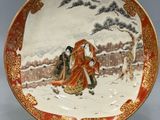 an image of a plate with a woman and a dog in the snow
