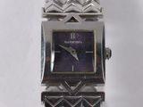 an image of a wrist watch with a purple face